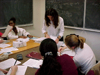 Peer Mentor Tutor working with a small group of students.